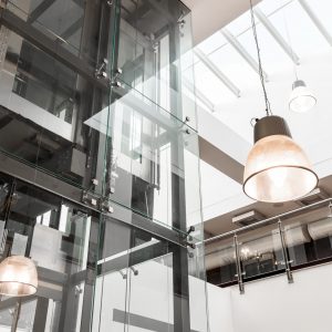 Glass elevator in modern building